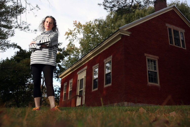 Veronique Plesch's home in Fairfield is next to fields where sludge was spread over the years. The state budget passed earlier this summer contains $30 million to test more than 500 sites statewide that received municipal sludge for use as fertilizer.