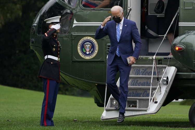 President Biden steps off Marine One on the South Lawn of the White House in Washington on Monday.


