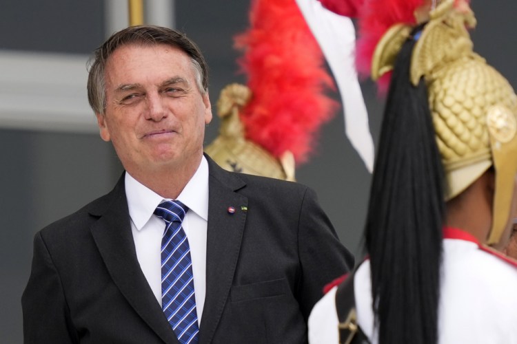 Brazilian President Jair Bolsonaro waits for the arrival of Colombia's President Ivan Duque to Planalto presidential palace in Brasilia, Brazil, Tuesday, Oct. 19, 2021. 