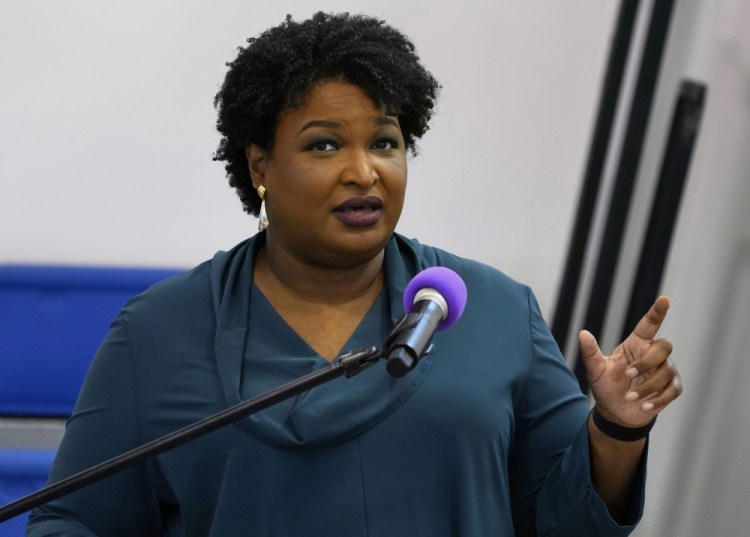 Stacey Abrams speaks during a church service in Norfolk, Va., Sunday, Oct. 17. 