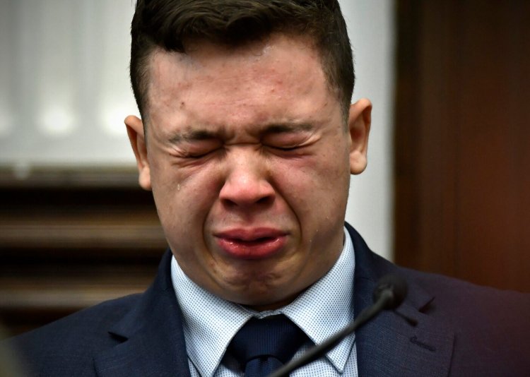 Kyle Rittenhouse breaks down on the stand as he testifies about his encounter with the late Joseph Rosenbaum during his trial at the Kenosha County Courthouse in Kenosha, Wis., on Wednesday. 