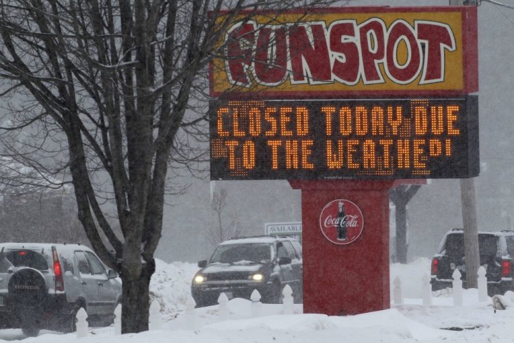 Funspot arcade in Laconia, N.H. is seen closed for the day on Feb. 12, 2014, as a winter storm passes through northern New England. Bob Lawton, the owner of Funspot, died Nov. 11, 2021, at the age of 90. (AP Photo/Jim Cole, File)