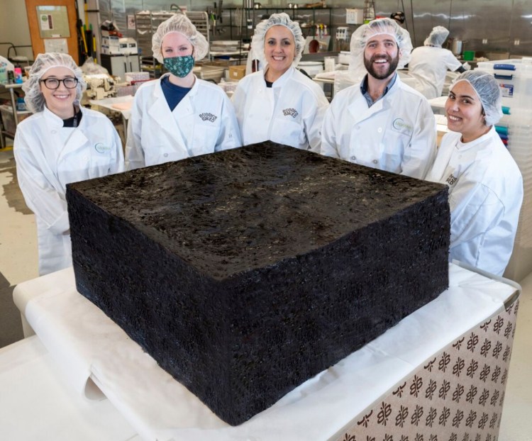 This pot brownie baked by a Massachusetts marijuana company measures 3 feet by 3 feet, 15 inches tall and 850 pounds.