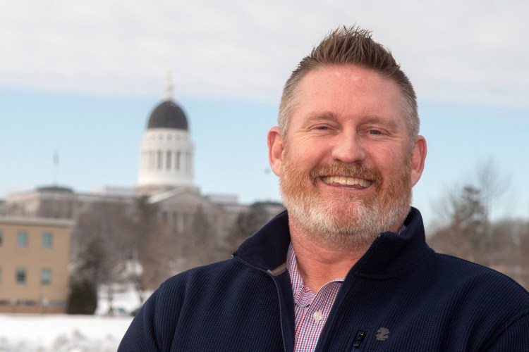 Augusta police Chief Jared Mills, seen in front of the Maine State House in Augusta in 2022, has retired from his post has the city's top cop. 