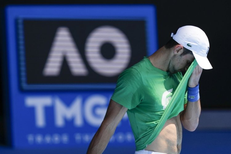 Novak Djokovic practices at Margaret Court Arena on Thursday before the Australian Open tennis championship in Melbourne.