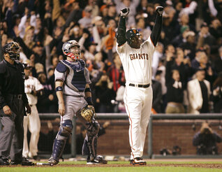 San Francisco Giants' Barry Bonds celebrates after hitting his 756th career home run against the Washington Nationals during the fifth inning of their baseball game in San Francisco, on Aug. 7, 2007. 
