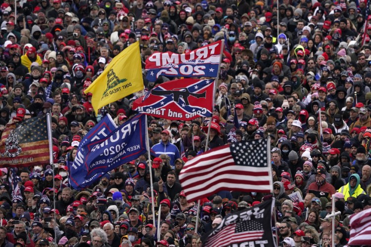 People attend a Trump rally Jan. 6 in Washington. 