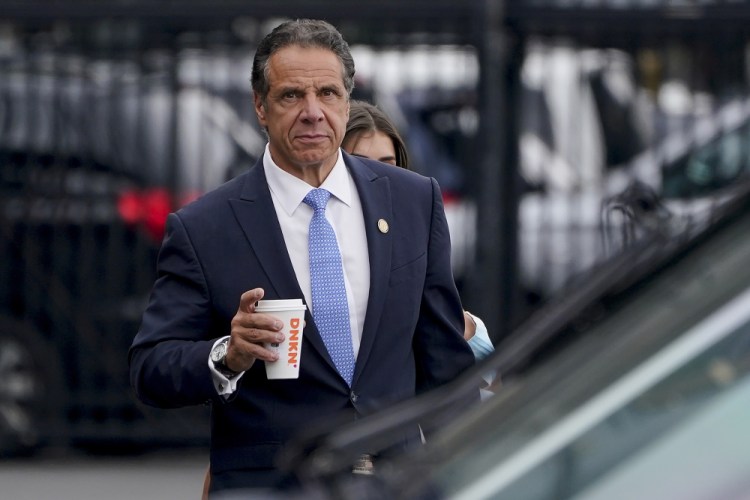 Then-New York Gov. Andrew Cuomo prepares to board a helicopter after announcing his resignation, Aug. 10 in New York. 