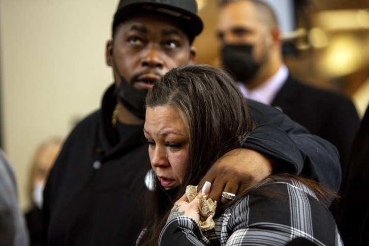 Daunte Wright's parents, Aubrey and Katie Wright, react after former Brooklyn Center police Officer Kim Potter was sentenced to two years in prison on Friday in Minneapolis. 