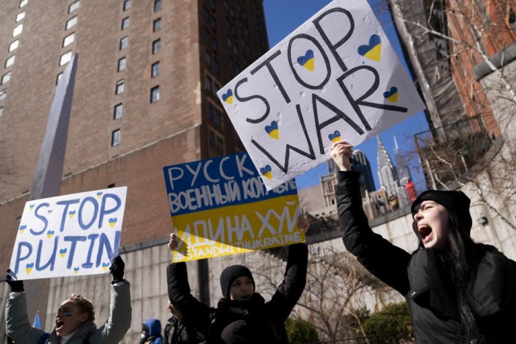 Demonstrators supporting Ukraine gather outside the United Nations during an emergency meeting of the U.N. General Assembly on Monday in New York. 

