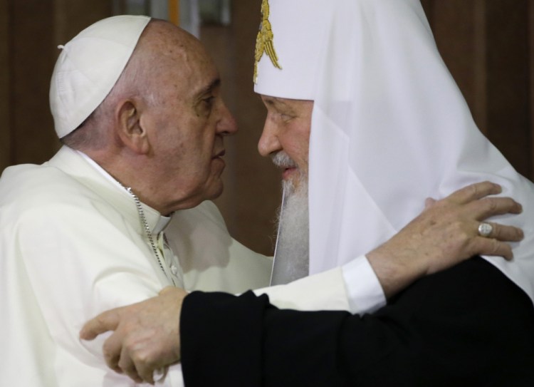 Pope Francis, left, embraces Russian Orthodox Patriarch Kirill after signing a joint declaration on religious unity in Havana, Cuba, in 2016. 
