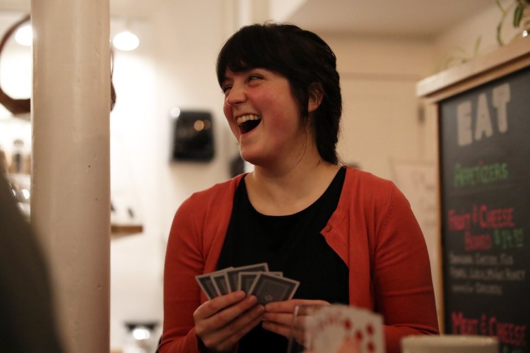 Taylor McCafferty, 29, of Portland, learned to play cribbage before the pandemic but played a lot more during it at home, with her boyfriend, who taught her. She's seen here playing with friends at the Knitting Nook in South Portland. 