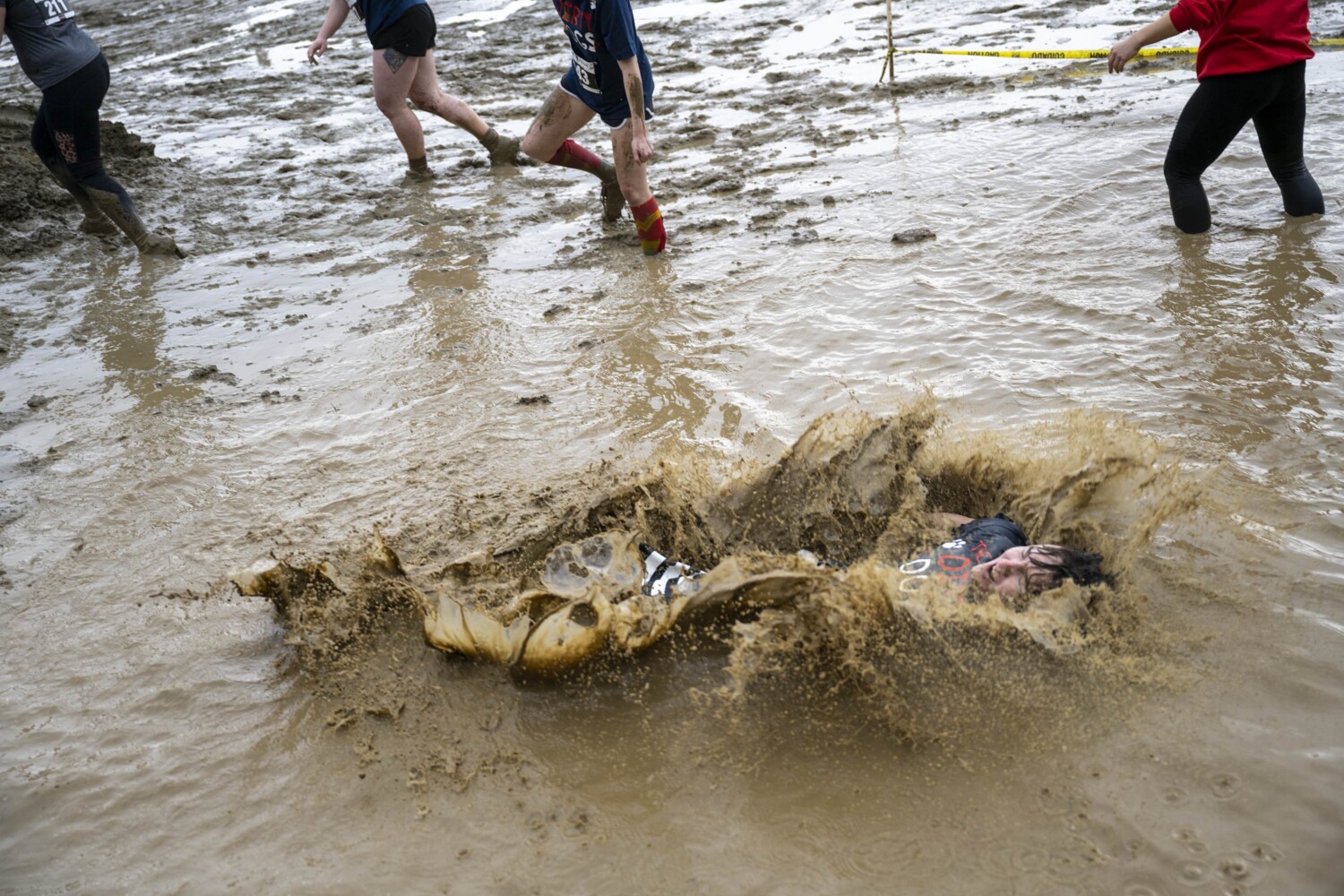 Participants get into the spirit at the Thomas College Dirty Dog Run
