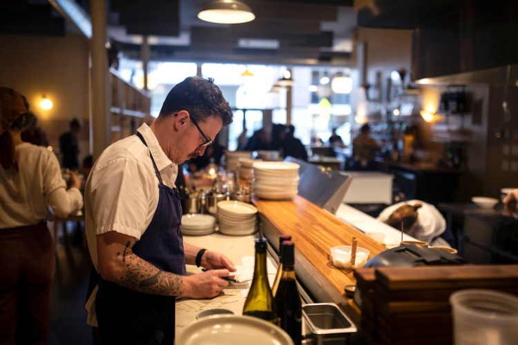 Jake Stevens, the chef and co-owner of Leeward, at the start of dinner service.