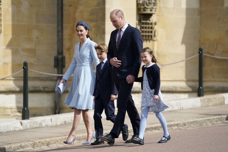Britain’s Prince William and Kate, Duchess of Cambridge, arrive with Prince George and Princess Charlotte to the Easter Mattins Service at St. George's Chapel at Windsor Castle in Berkshire, England, on Sunday.

