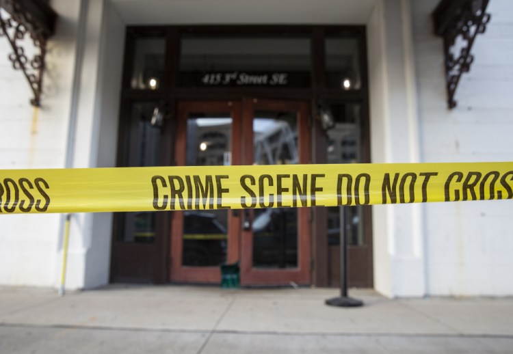 Crime scene tape blocks off the Taboo Nightclub and Lounge in Cedar Rapids, Iowa on Sunday. 