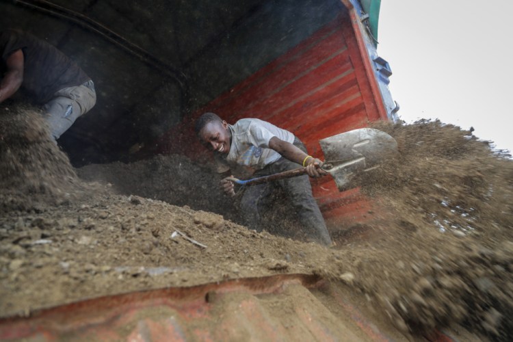 Farmers offload livestock manure  that will be used to fertilize crops due to the increased cost of fertilizer that they say they now can't afford to purchase, in Kiambu, Kenya. Russia is the world’s No. 1 exporter of nitrogen fertilizer and No. 2 in phosphorus and potassium fertilizers. Many developing countries rely on Russia for at least a fifth of their imports.