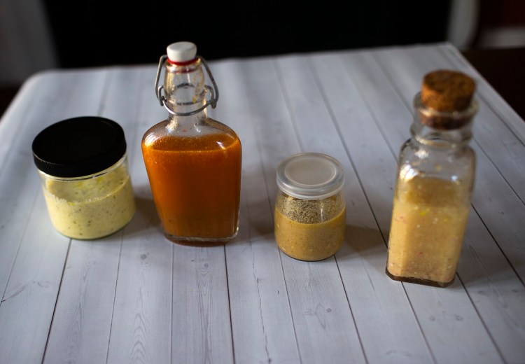 The bottled stuff is bad for the environment. Instead, make your own salad dressing. From left, Creamy Greek, Hot Chili Lime, Italian Lemon Anchovy, and Classic French Vinaigrette. 