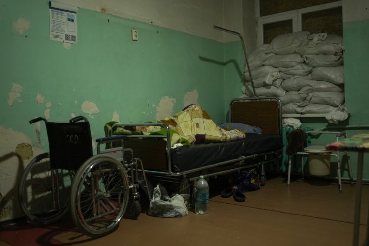 A patient rests at Pokrovsk hospital Sunday in Pokrovsk, eastern Ukraine.