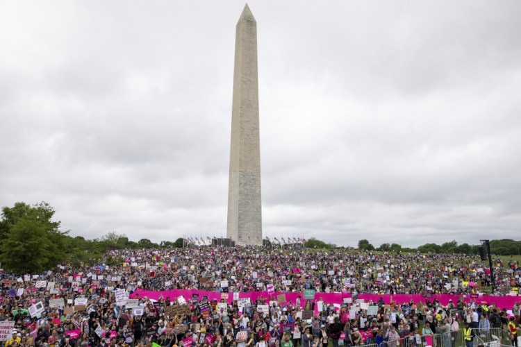 Abortion rights demonstrators rally, Saturday on the National Mall in Washington, during protests across the country. Amanda Andrade-Rhoades