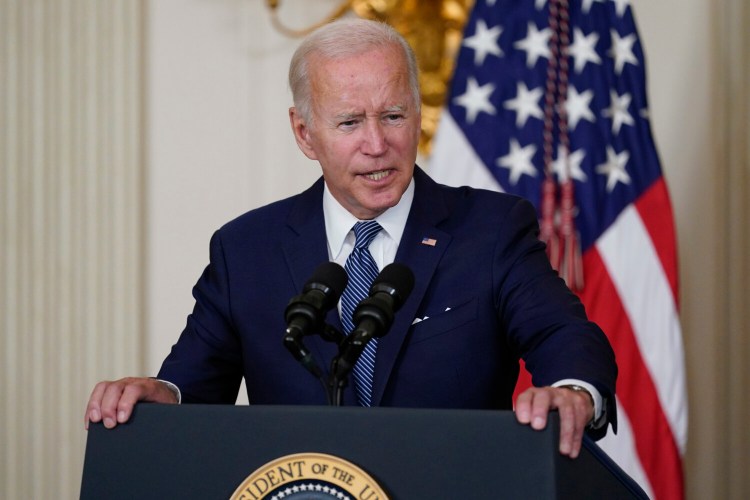President Joe Biden speaks before signing the Democrats' landmark climate change and health care bill in the State Dining Room of the White House in Washington, Tuesday, Aug. 16, 2022. (AP Photo/Susan Walsh)