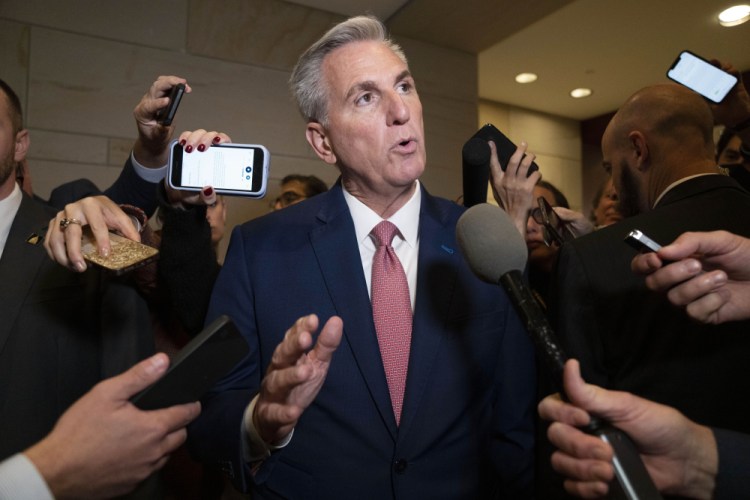 House Minority Leader Kevin McCarthy talks to reporters on Tuesday on Capitol Hill. In the next several weeks, he 
will need to shore up support from rank-and-file Republicans and the Freedom Caucus lawmakers, who likely will make demands of him before giving him their votes. 