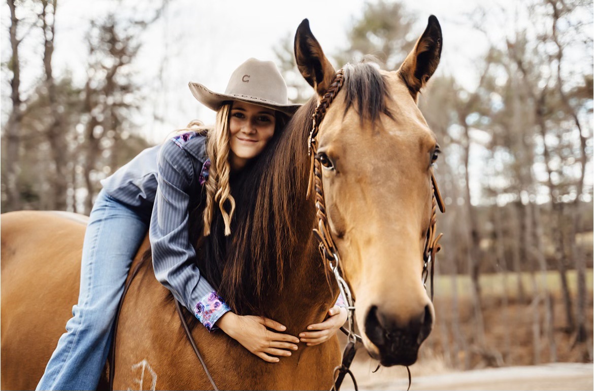STAR Student of the Month Gracie Laverdiere and one of her barrel racing competition horses.