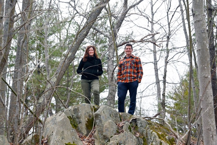 Lauren Sullivan and Adam Gardner, co-founders of the Maine-based environmental organization REVERB, at their home in Cape Elizabeth. 