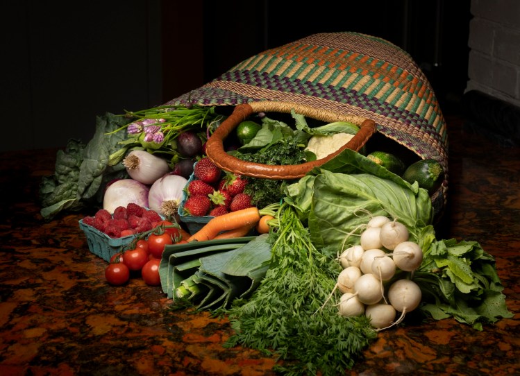 BRUNSWICK, ME Ð JUNE 8: Green Plate Special on how to store summer vegetables, like these local vegetables seen in an overflowing market basket, photographed on Thursday, June 8, 2023. (Staff photo by Gregory Rec/Staff Photographer)