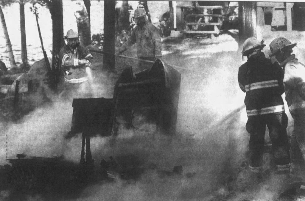 Oct. 9, 2002 Two inmates from Kennebec County Jail help control Pine