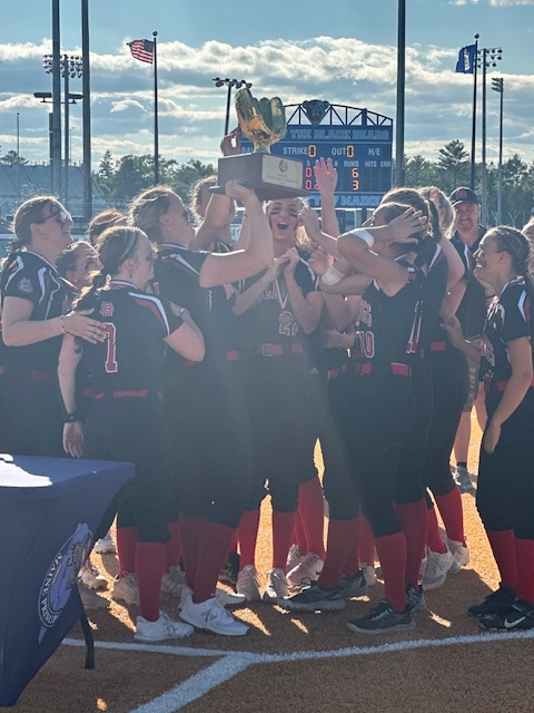 The Hall-Dale softball team holds up the Gold Glove after beating Bucksport 6-3 in the Class C state championship game Saturday at the University of Maine in Orono. It’s the fourth straight state title for the Bulldogs. 