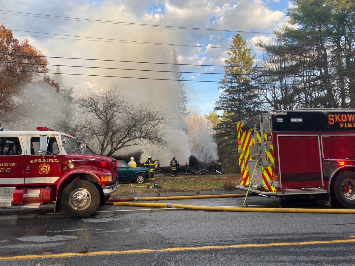 Firefighters battle a house fire on Waterville Road in Skowhegan Thursday around 4:30 p.m. The home was destroyed and its owner was injured, fire Chief Ronnie Rodriguez said.