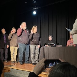 Four City Councilors raise their right hands to be sworn in to serve a two-year term on the City Council.
