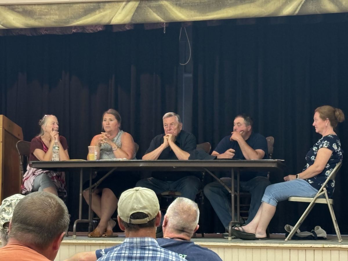 town officials on stage
