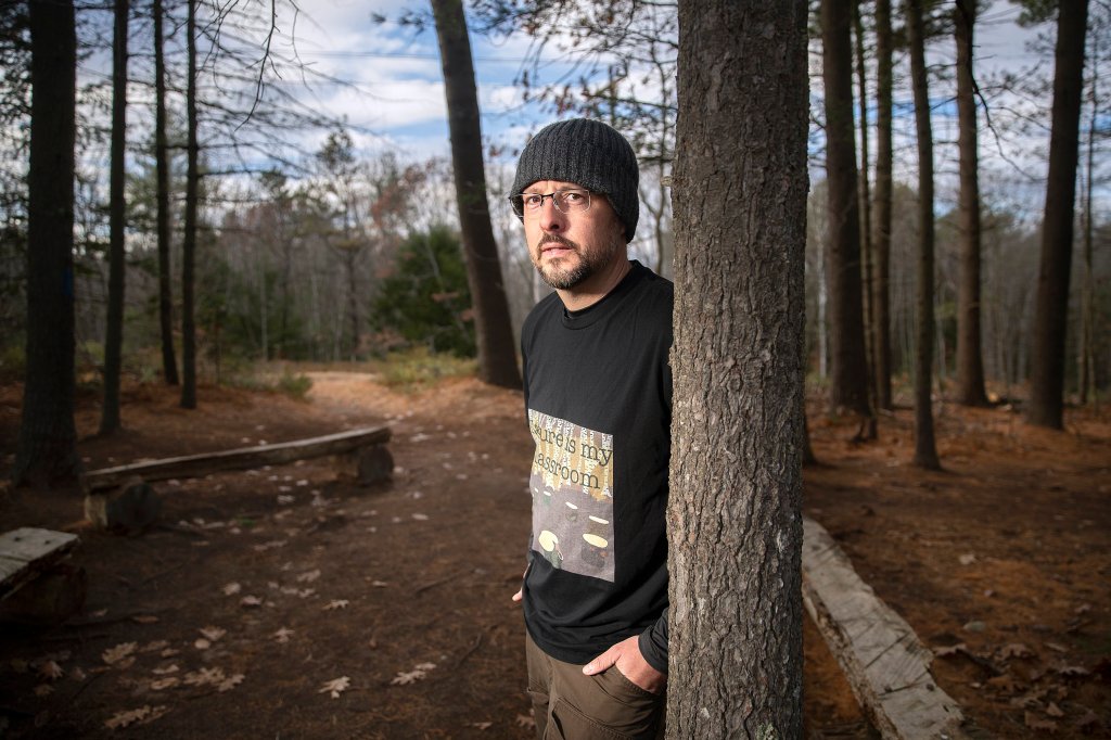 Topsham custodian Michael Langley takes the classroom outside