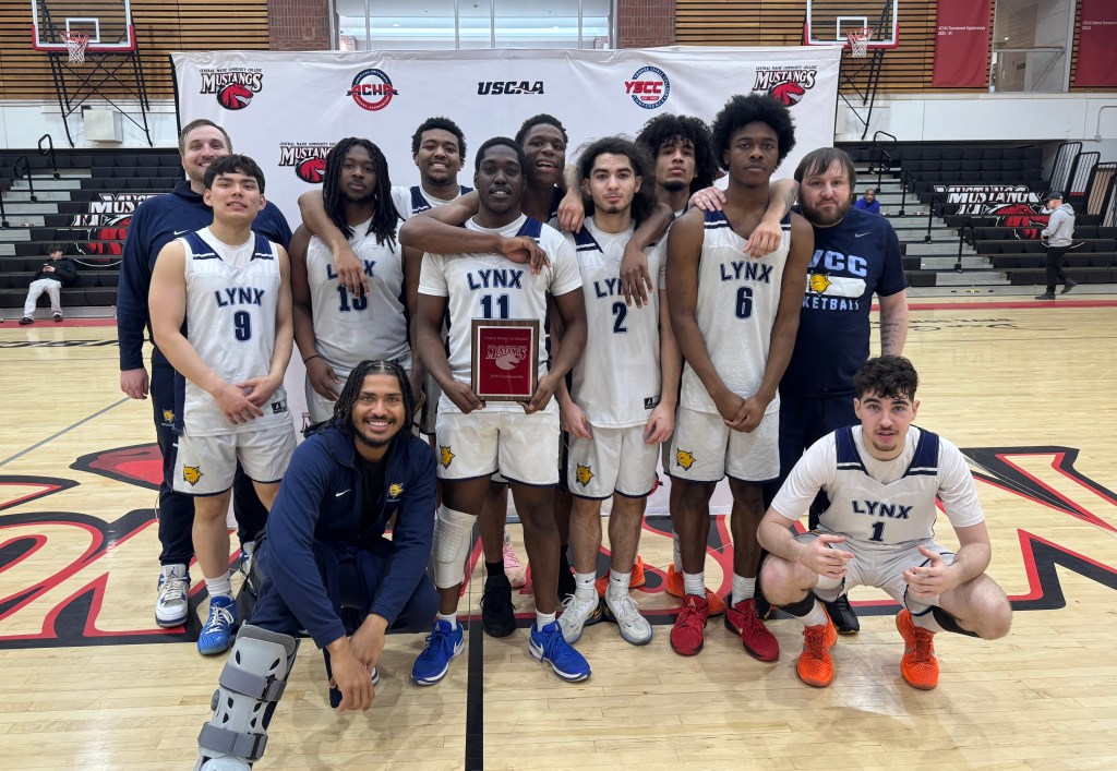 Members of the Kennebec Valley Community College men’s basketball teams show off their plaque after winning the Central Maine Invitational on Sunday at Central Maine Community College. The 2025-26 season was the first for KVCC’s men’s and women’s basketball programs. (Central Maine Community College photo)