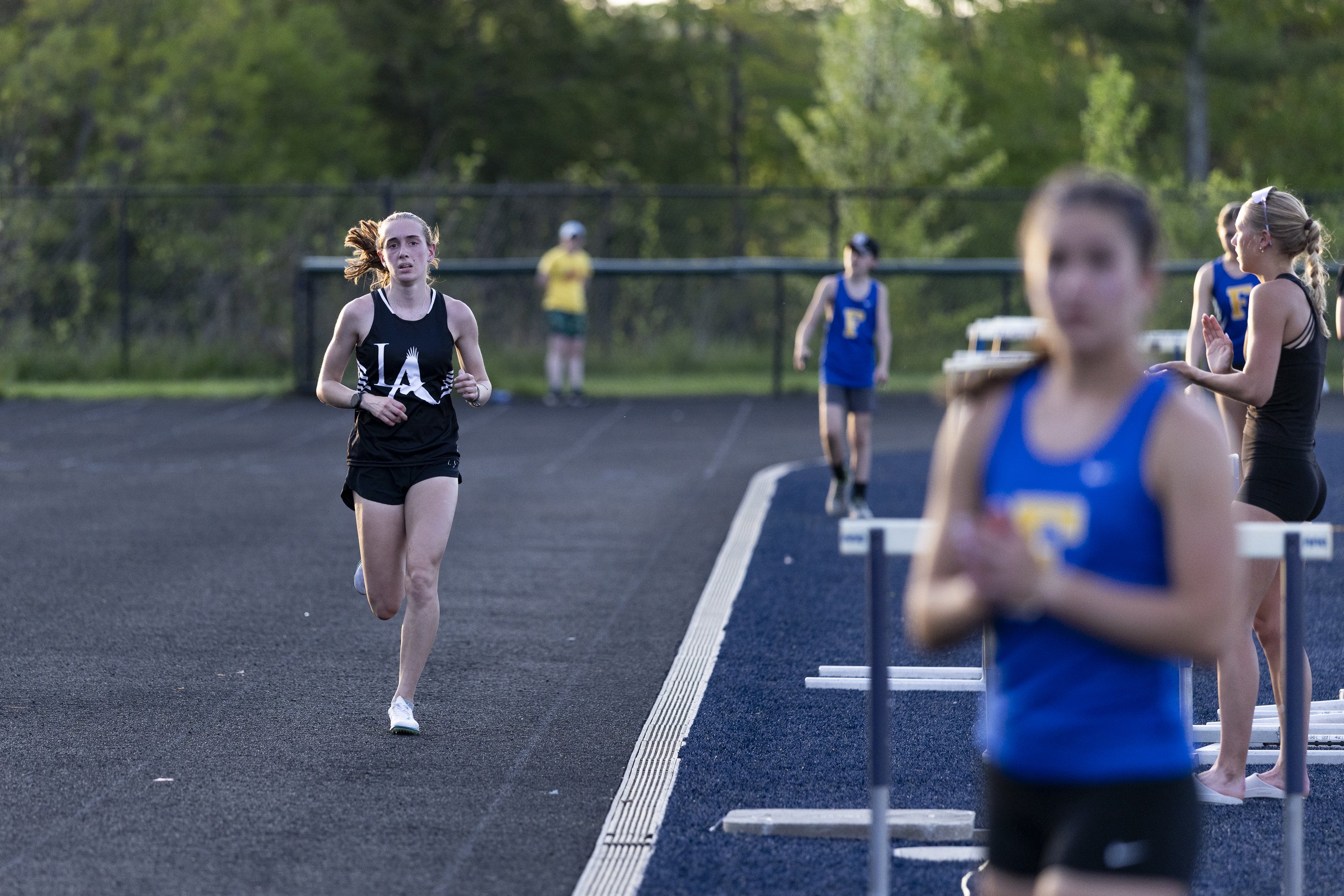 On the hottest day of the spring, Lincoln Academy runner went for it